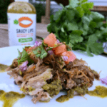 These instant pot carnitas are paleo, Whole30 friendly and use saucy lips zesty cilantro sauce for perfect pork in 90 minutes. | Thyme + JOY