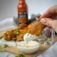 These instant pot crispy buffalo wings fall off the bone and are finished under a broiler for extra crisp. #whole30 #keto #paleo