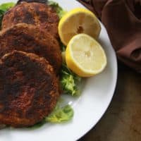 These blackened salmon burgers can be made in a pinch with canned wild salmon for a healthy meal any time of day.  #seafood #salmon #whole30 #paleo #keto