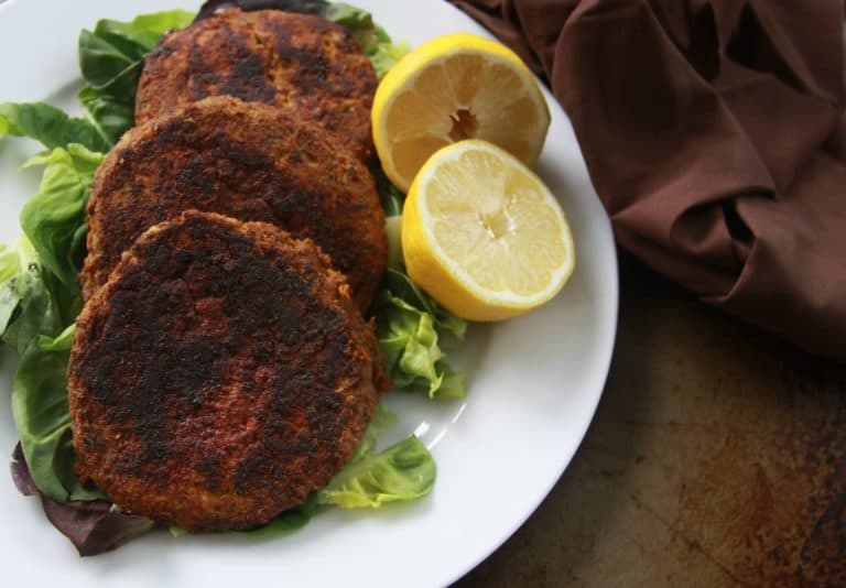 These blackened salmon burgers can be made in a pinch with canned wild salmon for a healthy meal any time of day.  #seafood #salmon #whole30 #paleo #keto