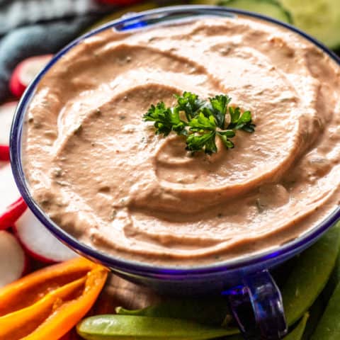 This thousand island dressing  recipe is made with simple ingredients from home. It is compliant with Whole30, Paleo & Keto and is great for topping salads, chicken and burgers. 