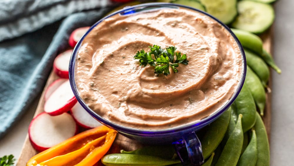 This thousand island dressing  recipe is made with simple ingredients from home. It is compliant with Whole30, Paleo & Keto and is great for topping salads, chicken and burgers. 