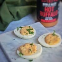 These buffalo deviled eggs are perfect for parties or to have as a healthy snack.  #whole30 #keto #paleo #glutenfree