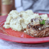 This hearty salisbury steak is an upgraded burger smothered in homemade mushroom gravy. #whole30 #paleo #keto