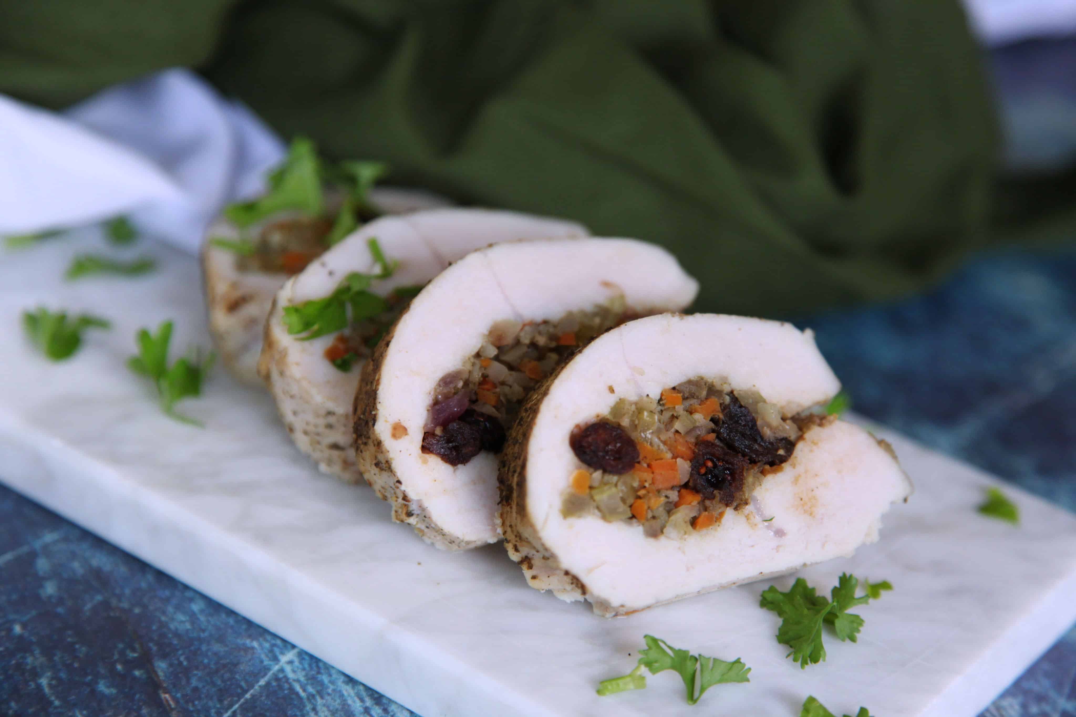 This stuffed turkey tenderloin is a perfect hearty holiday dish that will please all types of eaters. #whole30 #paleo #keto #thanksgiving #lowcarb