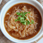 This french onion soup is made easy in the instant pot. It contains onions, beef broth and herbs for a deep caramelized onion flavor. #keto #whole30 #lowcarb #instantpot #soup