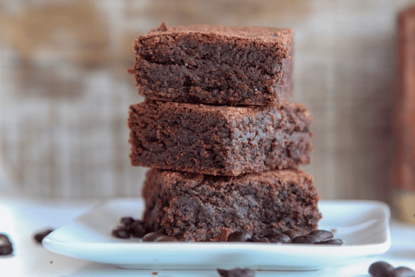 These 3 ingredient nutella brownies come together fast without the need for butter, cocoa powder or baking powder. Makes a quick and easy fudgy brownie dessert with a great hazelnut chocolate taste. Can be made gluten free easily! #chocolate #dessert #brownies #nutella