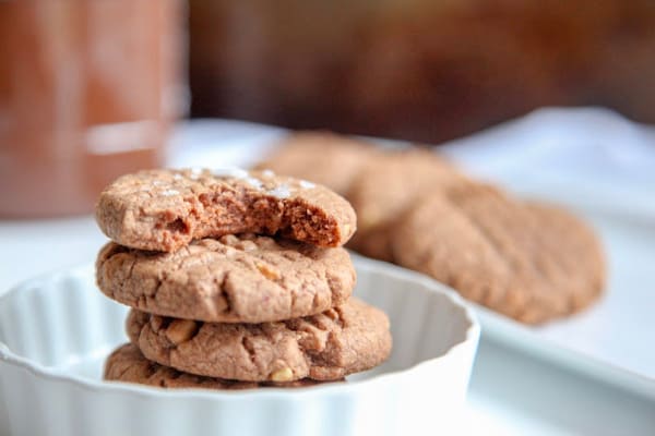 These peanut butter nutella cookies are soft on the inside with a slight crunch on the outside. They are made with only 5 ingredients including peanut butter, nutella, sugar, eggs and flour. Can easily be made gluten free. 
