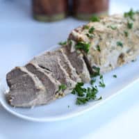 This rosemary mustard pork tenderloin is marinated with rosemary, dijon mustard, and baked in the oven for a pork tenderloin recipe that everyone will love. Rosemary pork tenderloin is suitable for the whole30, paleo and keto diet. 