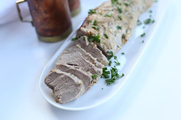 This rosemary mustard pork tenderloin is marinated with rosemary, dijon mustard, and baked in the oven for a pork tenderloin recipe that everyone will love. Rosemary pork tenderloin is suitable for the whole30, paleo and keto diet. 