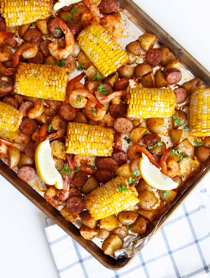shrimp, potato. sausage and corn on sheet pan