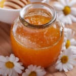 raw honey with daisies
