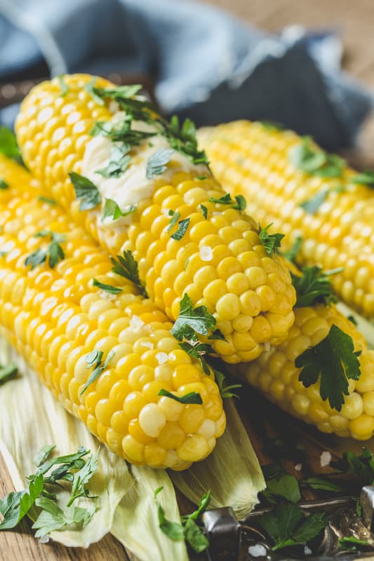 corn on the cob with herbs and butter