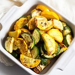 air fried zucchini and yellow squash in a white dish