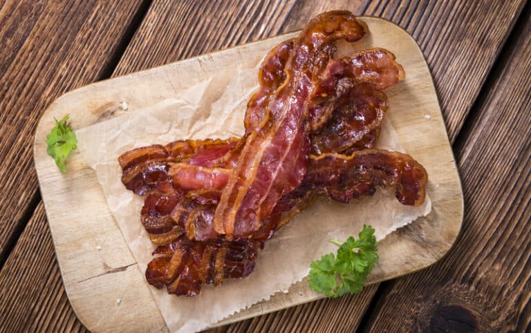 bacon on a wooden cutting board