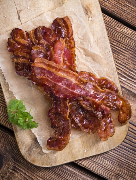 bacon on a wooden cutting board