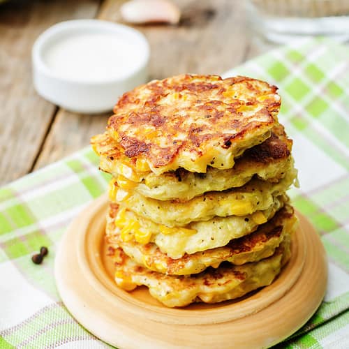 corn fritters in a stack