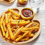 polenta fries on a plate with dipping sauce