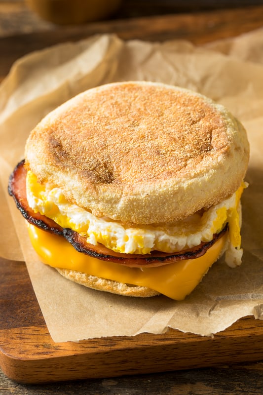 cooked breakfast sandwich on english muffin