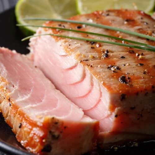 sliced tuna steak with lemon
