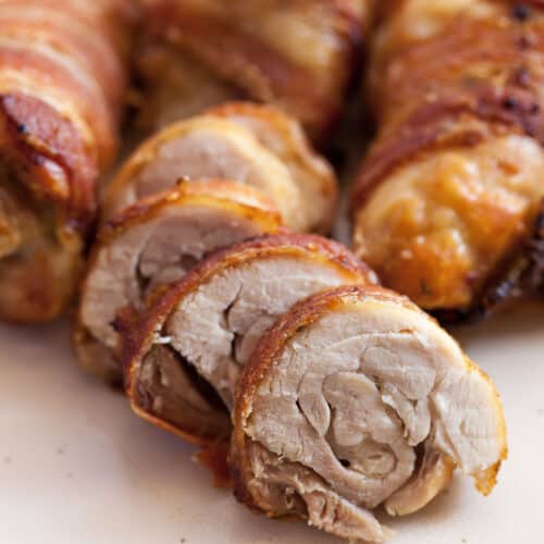 bacon wrapped chicken thighs sliced