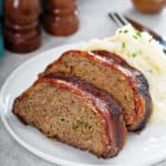 sliced bison meatloaf with mashed potatoes