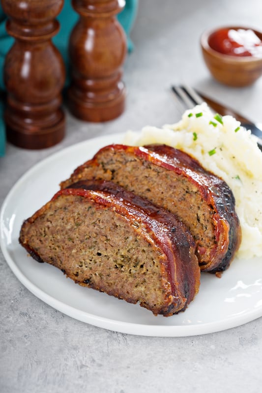 sliced bison meatloaf with mashed potatoes