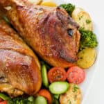 cooked turkey legs with vegetables