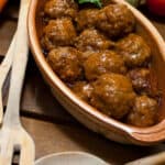 meatballs in a dish with a spoon