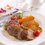 roasted duck breast on a plate