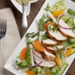 sliced turkey tenderloin with salad