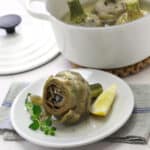 boiled artichoke on a plate